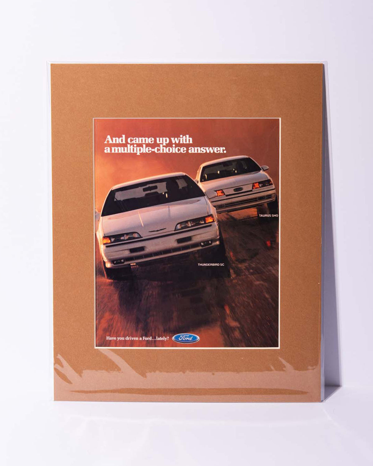 Original vintage Ford ad with MN12 Thunderbird SC and Taurus SHO DN5