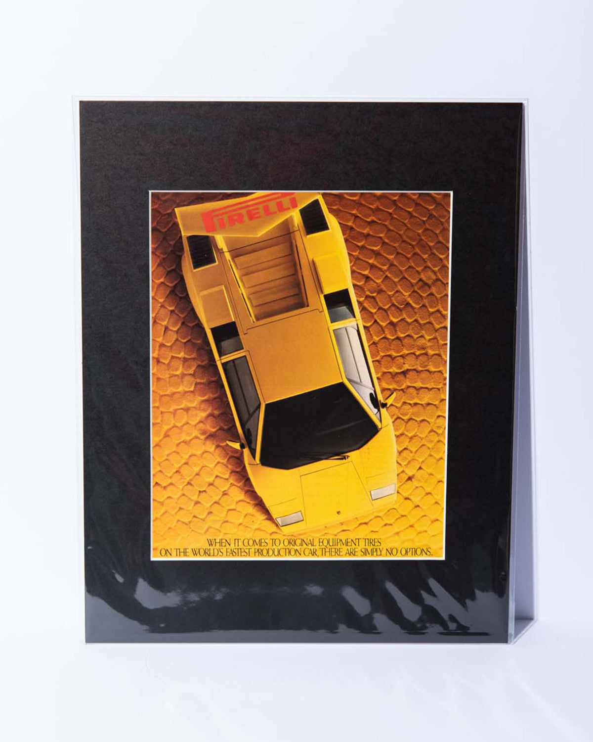Pirelli Tires ad featuring Yellow Lamborghini Countach - original vintage mated magazine ad
