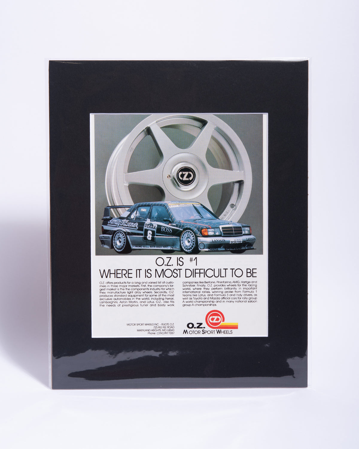 O.Z. wheels original vintage mated advertisement featuring 190E Evo II DTM racecar