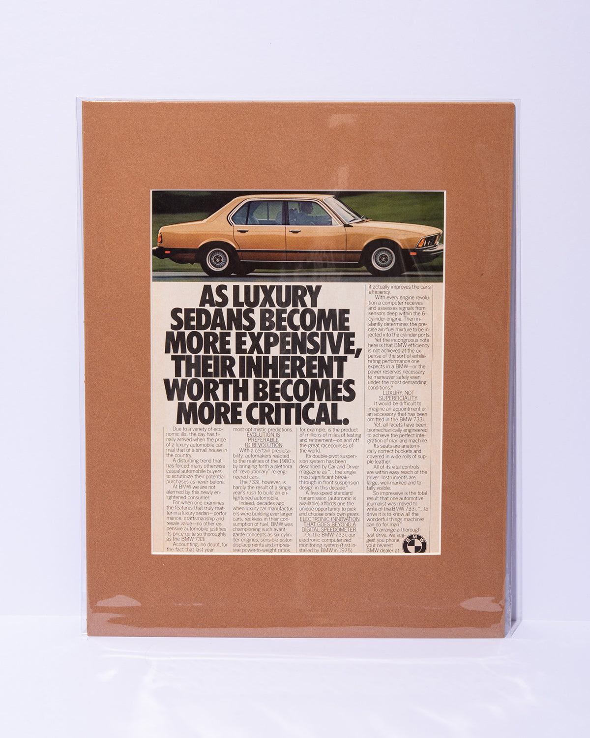 E32 BMW 733i "As luxury sedans become more expensive..." original vintage mated ad