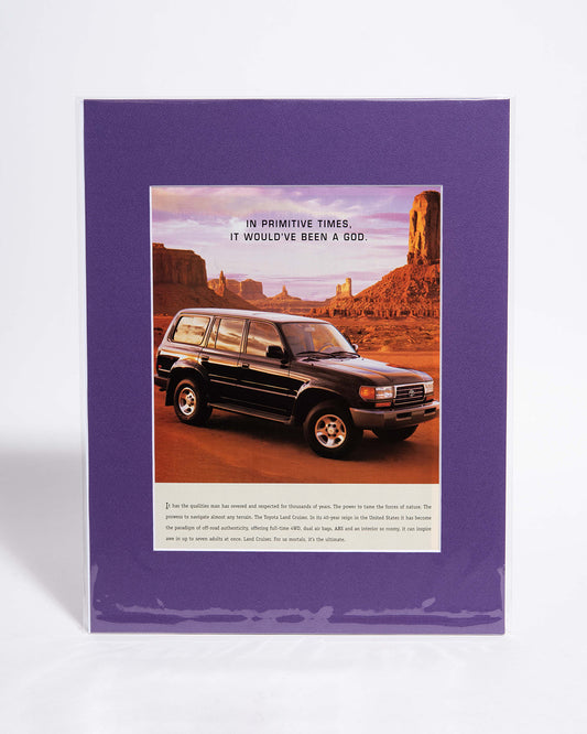 Toyota Land Cruiser "In Primitive Times..." original vintage mated advertisement