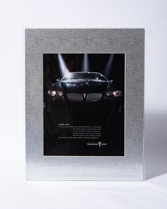 5th Gen Pontiac GTO "Going Fast" original vintage mated ad