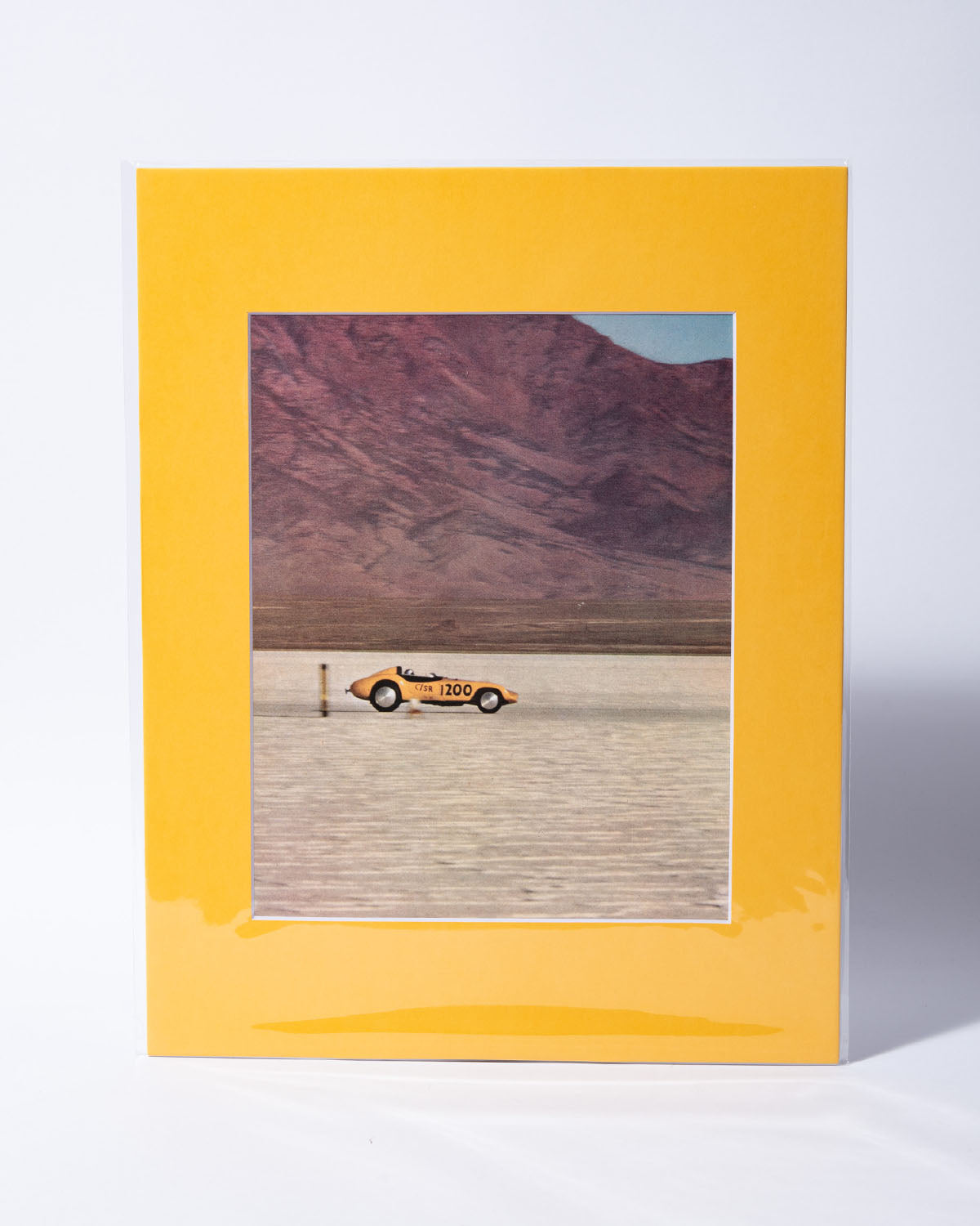 Mooneyes Moonbeam Devin sports car racing on salt flats - original vintage mated image